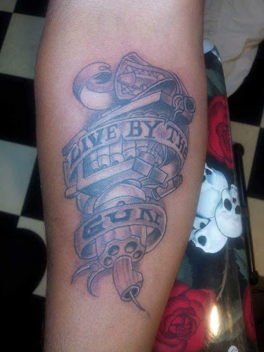Explore forearm men tattoo ideas, creative tattoo ideas in Columbia, available at Nyce Tattoos