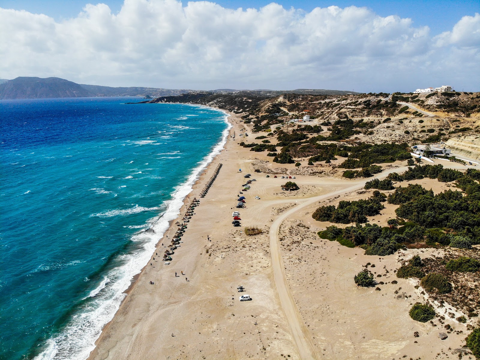 Photo of Magic Beach backed by cliffs