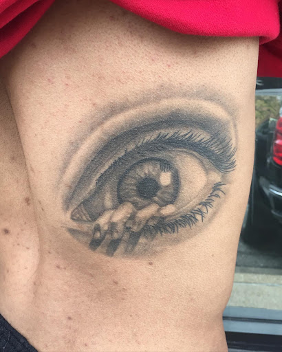 Explore rib tattoo ideas for women, creative tattoo ideas in Jessup, available at Savage Ink Tattoo Studio