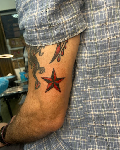 Find camping tattoo ideas for your next unique tattoo in Belgrade at The Loyal Sparrow Tattoo and Piercing