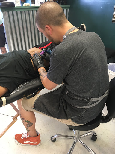 Explore matching halloween tattoo ideas, creative tattoo ideas in Kent, available at War Horse Ink