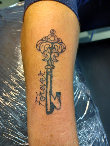 Explore mens sleeve tattoo idea, creative tattoo ideas in Owosso, available at Twisted ink tattoo