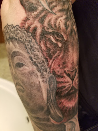 Explore walking dead tattoo ideas, creative tattoo ideas in Waukesha, available at Waukesha Tattoo Company Galleria Edge