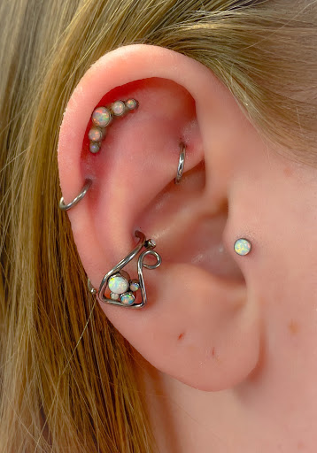 Explore name tattoos ideas, creative tattoo ideas in Springfield, available at Body Piercing By Qui Qui