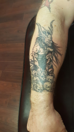 Explore breastfeeding tattoos ideas, creative tattoo ideas in Forest Lake, available at Dicks Tattoo