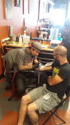 Explore small snake tattoo ideas, creative tattoo ideas in Yuba City, available at Artistic Temple Social Club