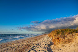 Foto von Karamea Beach mit langer gerader strand