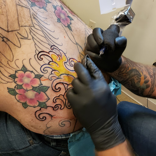 Explore thigh piece tattoo ideas, creative tattoo ideas in Tea, available at Red Arbor Tattoo