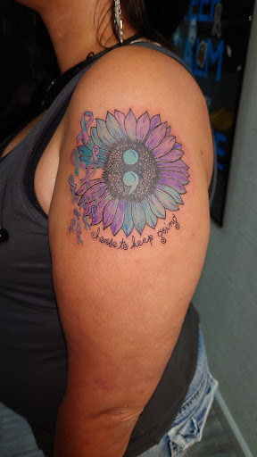 Explore unique tramp stamp tattoo ideas, creative tattoo ideas in Jonesboro, available at Immortal Ink