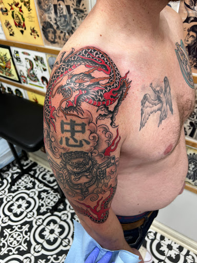 Explore tattoos for behind the ear ideas, creative tattoo ideas in Milwaukee, available at MANIA Tattoos Milwaukee