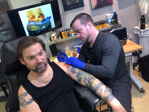 Explore fish tattoo ideas for females, creative tattoo ideas in Fort Wayne, available at Grade A Tattoos and Body Piercing