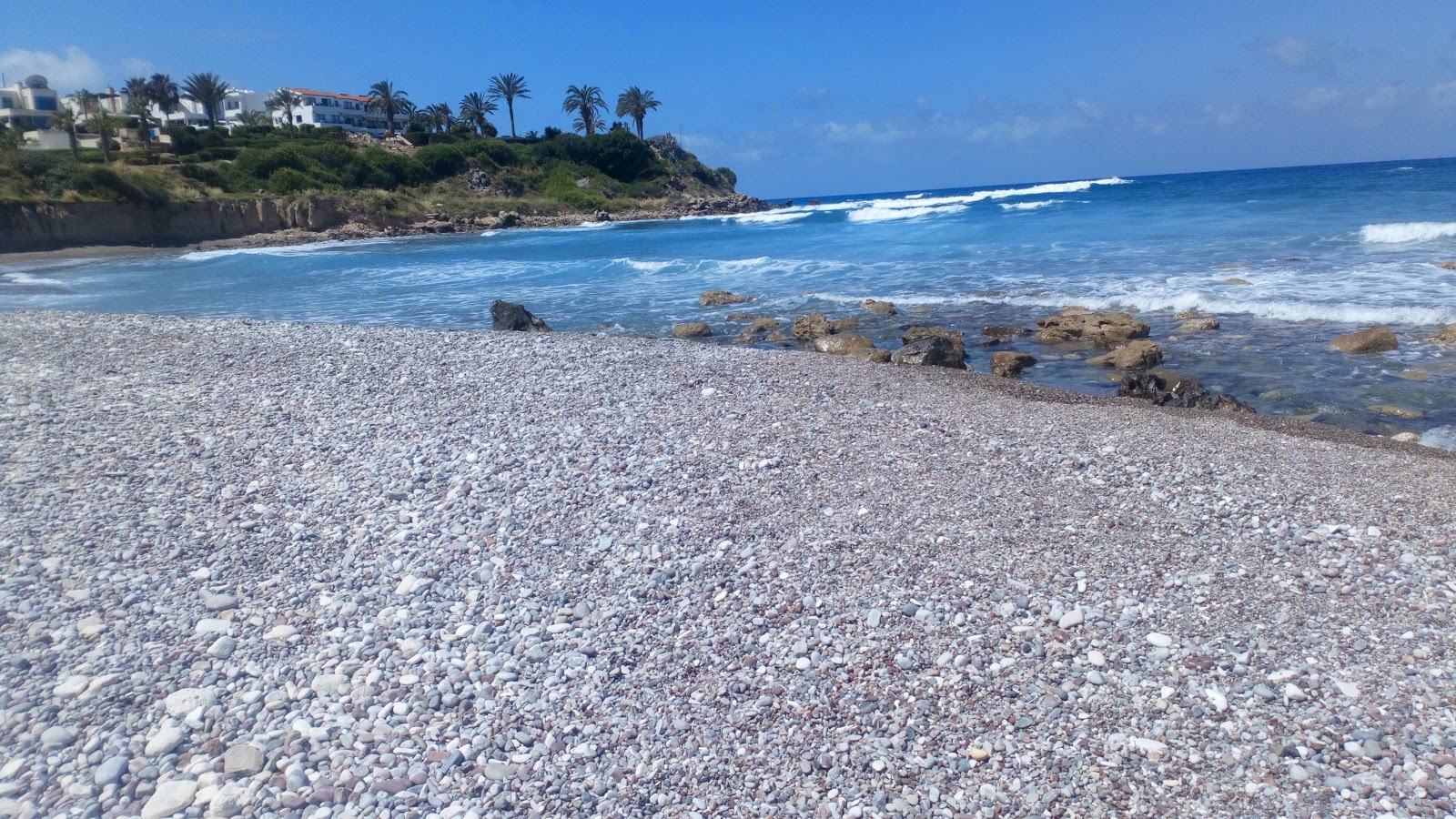 Foto di Potima beach con baia grande