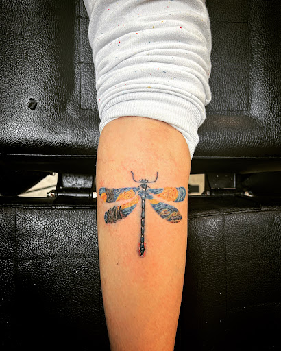 Explore chest piece tattoo ideas male, creative tattoo ideas in Cocoa, available at Rorschach Tattoo Shop and Piercing Studio