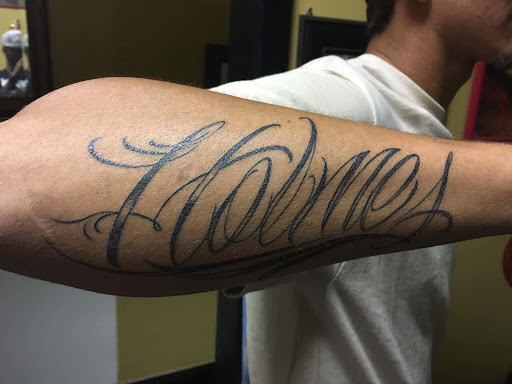 Explore upper arm men tattoo ideas, creative tattoo ideas in Savannah, available at Tatlyfe Studios