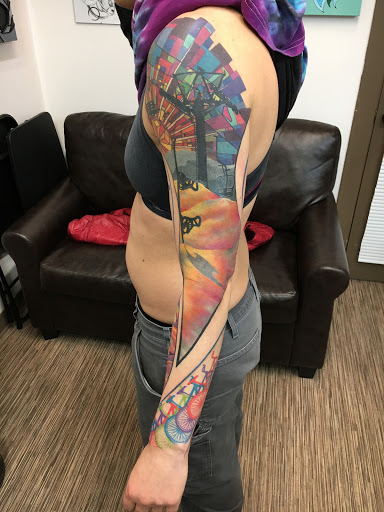 Explore colored tattoo sleeve ideas, creative tattoo ideas in Portland, available at Obsidian Tattoo