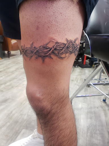 Explore religious elbow tattoo ideas, creative tattoo ideas in Linn Creek, available at Hillard Skillard Tattoos, LLC.