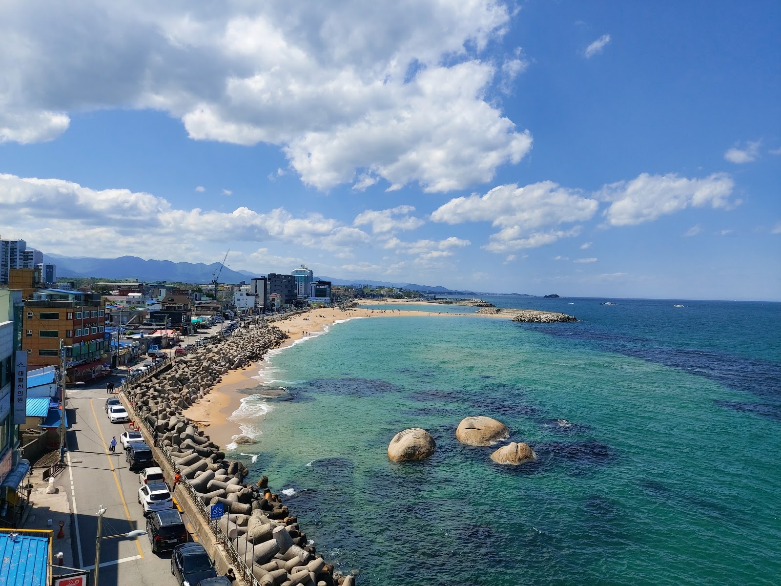 Photo of Lighthouse Beach and the settlement