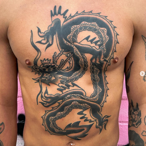 Explore mens inner bicep tattoo ideas, creative tattoo ideas in San Diego, available at San Diego Tattoo Company