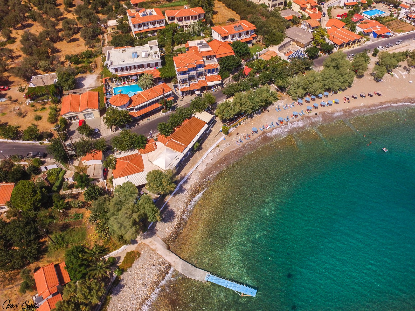 Fotografie cu Votsalakia beach cu o suprafață de apă pură albastră