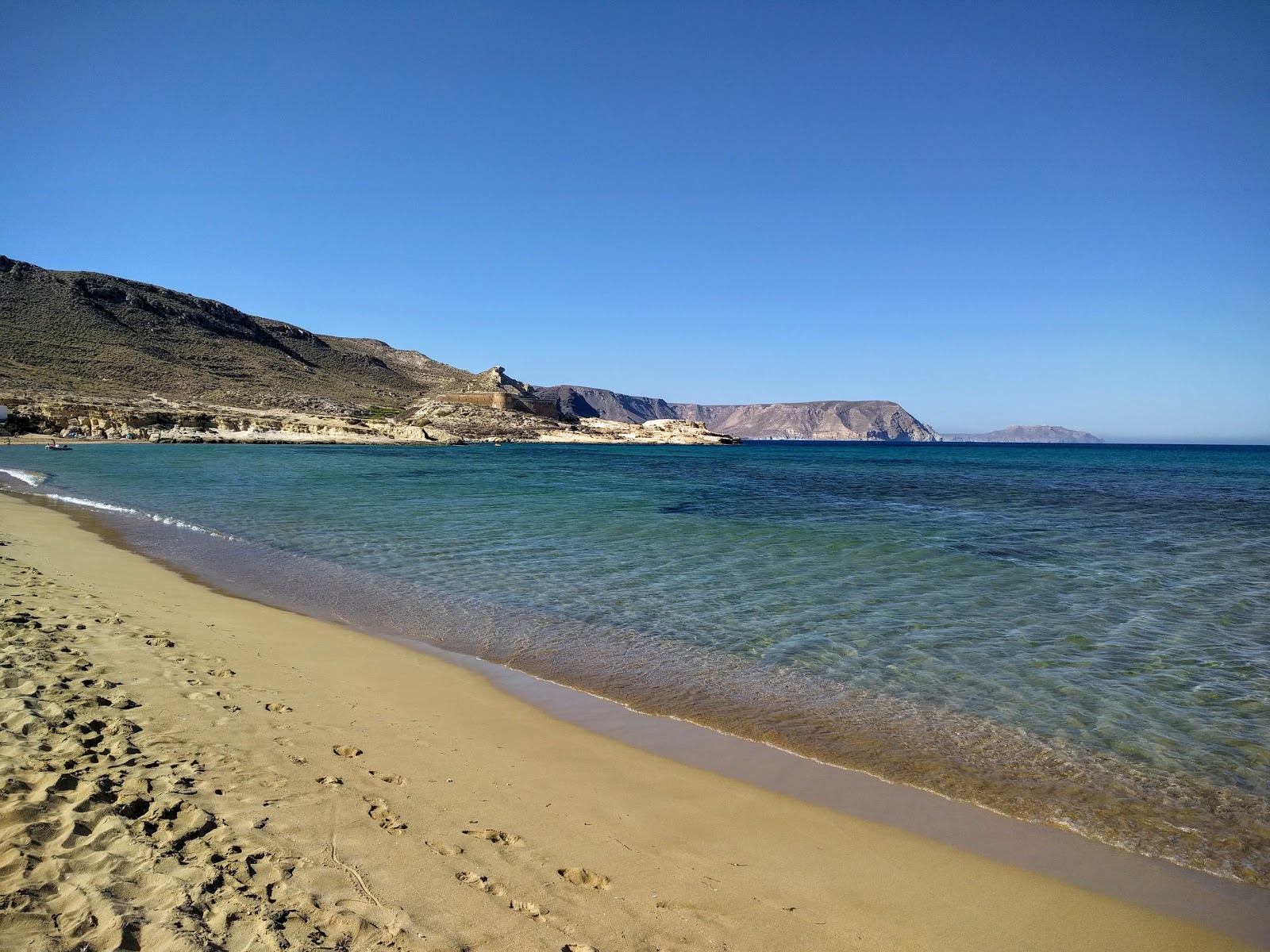 Photo de Calilla del Playazo avec sable brun de surface