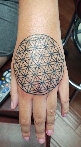 Explore ankle heart tattoo ideas, creative tattoo ideas in Center Line, available at Elite Ink Tattoo Studios