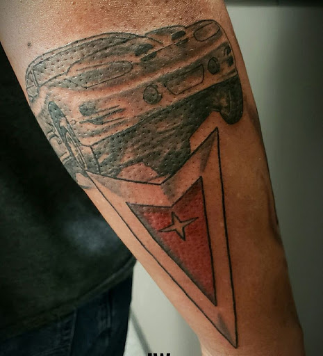 Explore red tattoo ideas women, creative tattoo ideas in Flint, available at Black Eye Social Club Tattoo