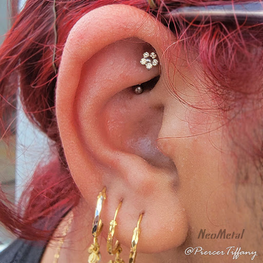 Explore white ink tattoo ideas, creative tattoo ideas in Somerville, available at Piercings by Tiffany at Artisanal Tattoo