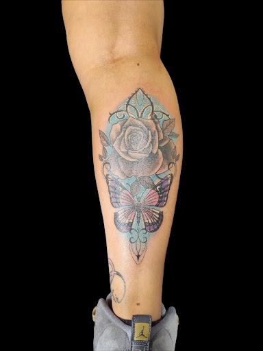 Explore rose foot tattoo ideas, creative tattoo ideas in Crystal City, available at Meraki Tattoo and Piercing
