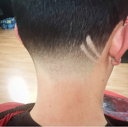 Explore hood tattoo ideas for men, creative tattoo ideas in Wenatchee, available at RZR SHARP BARBER & TATTOO