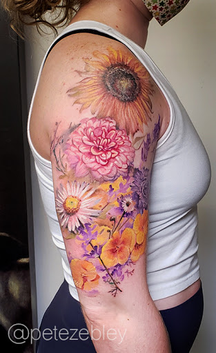 Explore tattoo arm sleeve ideas woman, creative tattoo ideas in Philadelphia, available at Central Tattoo Studio