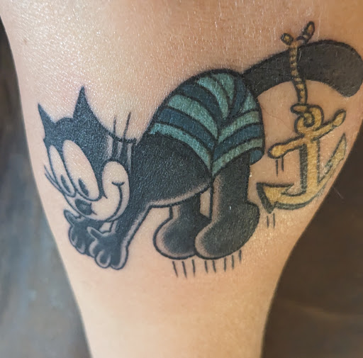 Explore tattoo ideas in french, creative tattoo ideas in Oceanside, available at The Arcade Oceanside Tattoo
