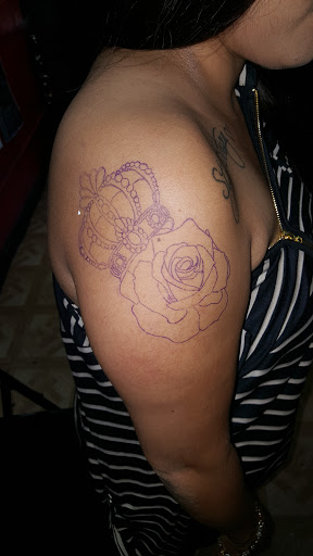 Explore lower back cover up tattoo ideas, creative tattoo ideas in Los Angeles, available at South Central Tattoos