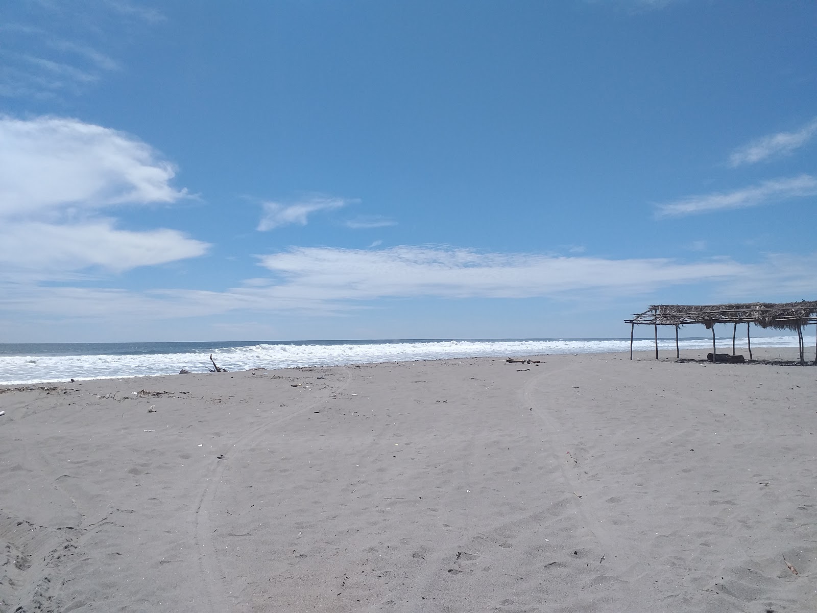 Foto av Tasajera beach med grå sand yta