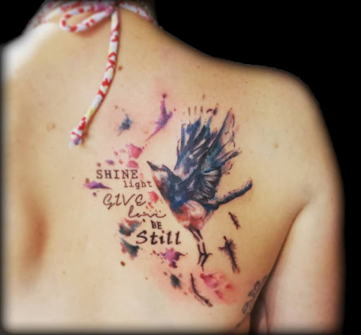 Explore lilac tattoo ideas, creative tattoo ideas in Minneapolis, available at Minneapolis Tattoo Shop