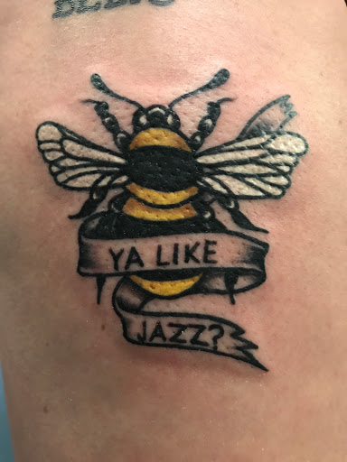 Explore tim burton tattoo sleeve ideas, creative tattoo ideas in Muncie, available at The Tattoo Studio