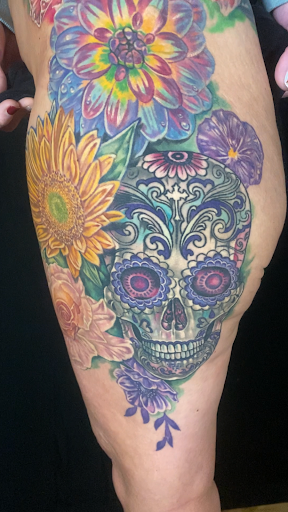 Explore tattoo ideas for women thigh, creative tattoo ideas in Concord, available at Arrows and Embers Custom Tattoo