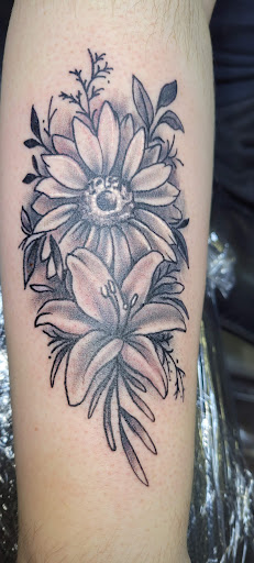 Explore tattoo idea generator, creative tattoo ideas in Angola, available at Hoodlum Ink