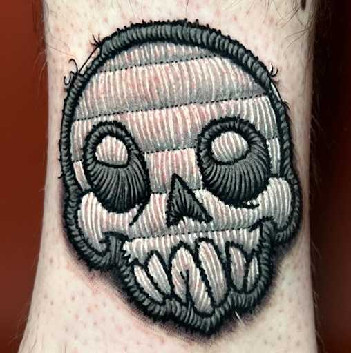 Explore cute flower tattoo ideas, creative tattoo ideas in Saint Paul, available at Black Coffin Tattoo