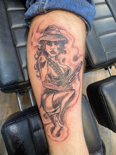 Explore tattoo ideas womens thigh, creative tattoo ideas in Pikeville, available at The Carbon Canary Tattoo Studio