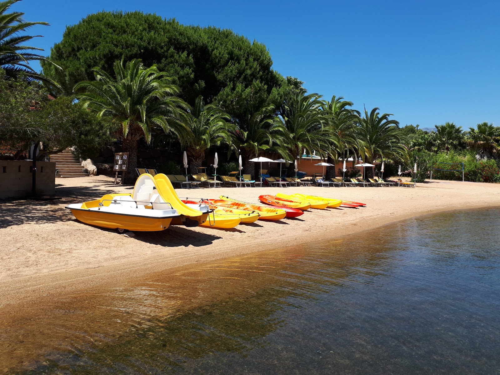 Photo of Port de Figari with bright sand surface