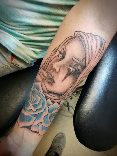 Explore arm sleeve tattoo ideas for men, creative tattoo ideas in Flint, available at Black Eye Social Club Tattoo