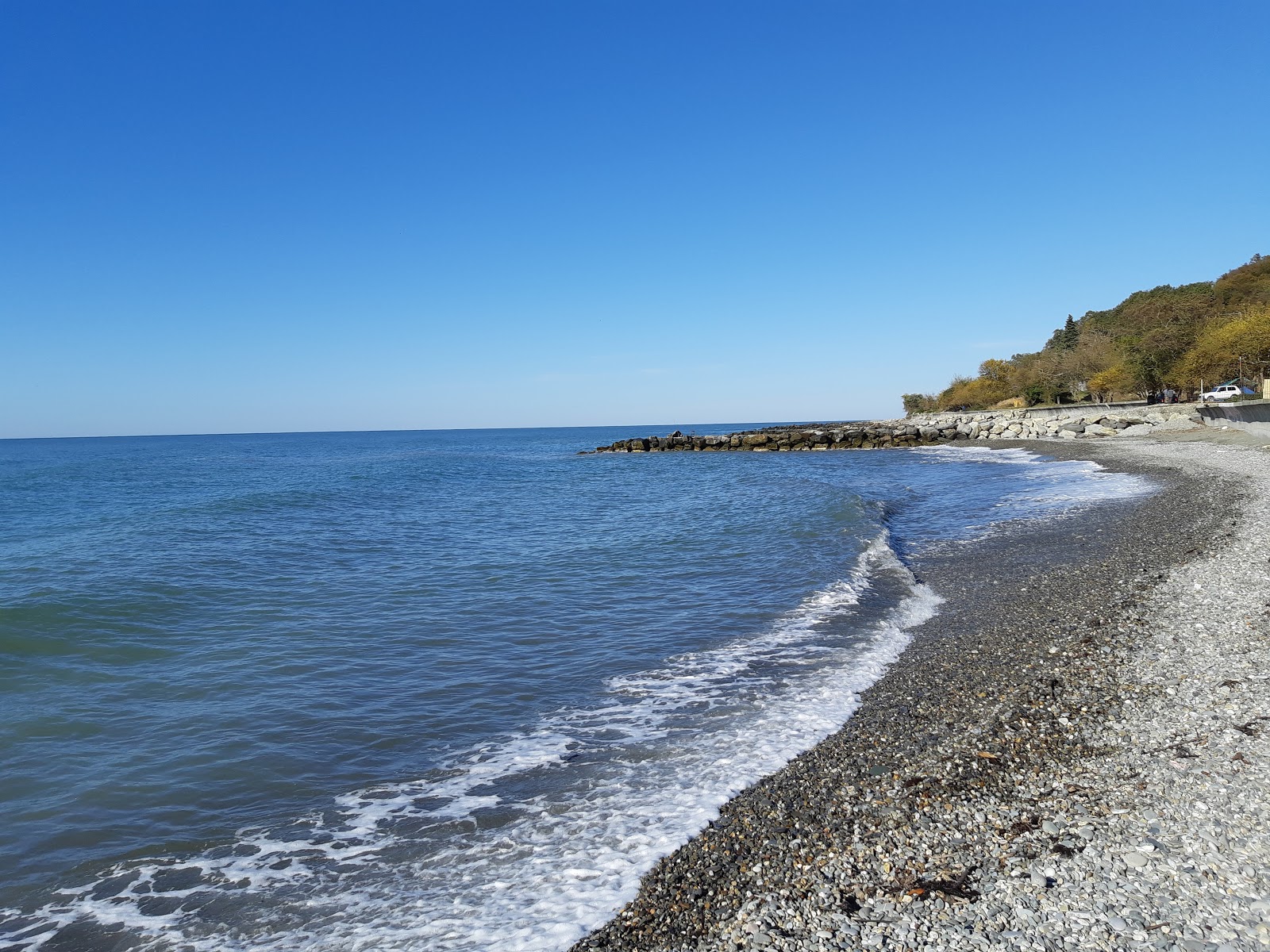 Photo of Nizhniy Khobza beach with gray pebble surface