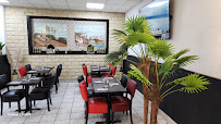 Atmosphère du Restaurant marocain Restaurant la palmeraie grillade à la braise à Le Pont-de-Claix - n°1