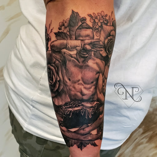 Explore tattoo ideas female thigh, creative tattoo ideas in Manchester, available at Neon Lady Tattoo Studio and Art Gallery