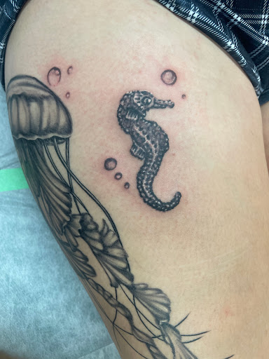 Find tattoo ideas for a mom for your next unique tattoo in Sioux City at Asawolf Viking Tattoo