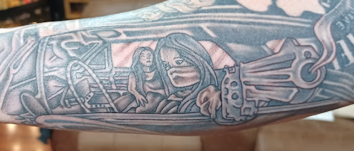 Explore forearm sleeve tattoo ideas for females, creative tattoo ideas in Shippensburg, available at LAZY WIZARD TATTOOS