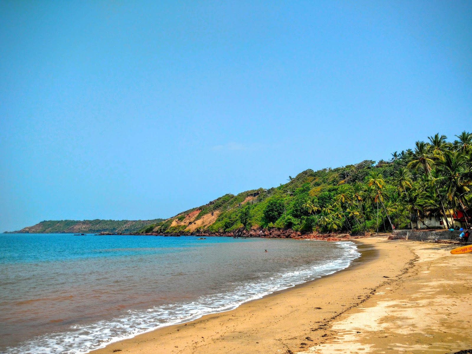 Foto de Canaguinim Beach com areia brilhante superfície