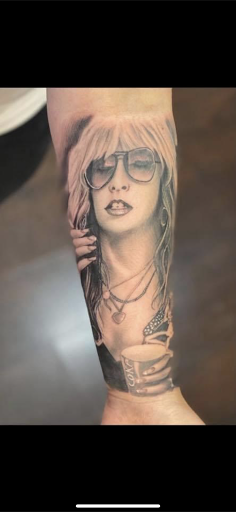 Explore ladies arm tattoo ideas, creative tattoo ideas in Lemoyne, available at Ego Ink Tattoo & Body Piercing Shop