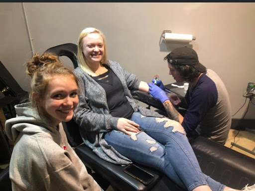 Explore hand mens tattoo ideas, creative tattoo ideas in Fort Wayne, available at Grade A Tattoos and Body Piercing