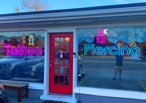 Explore jupiter tattoo ideas, creative tattoo ideas in Wilmington, available at The Gay Penguin Piercing and Tattoo in Wilmington Nc